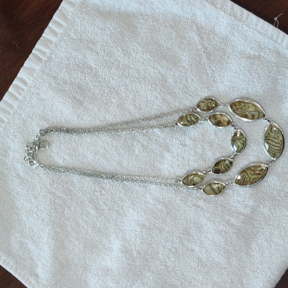 Greenish brown tiger eye look necklace.